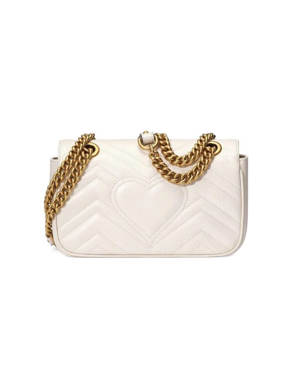 12663243_12272215_1000.jpg Gucci white GG Marmont matelassé mini bag