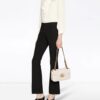 12964825_21889352_1000.jpg Gucci GG Marmont small matelassé shoulder bag