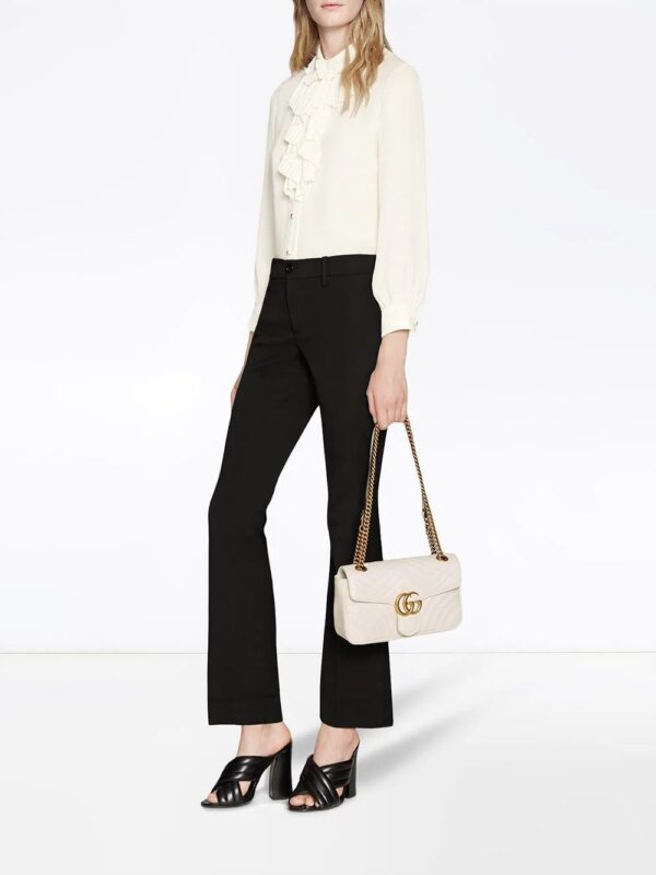 12964825_21889352_1000.jpg Gucci GG Marmont small matelassé shoulder bag