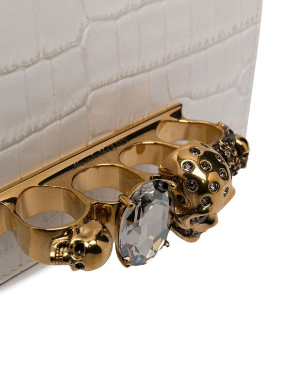 16070868_30184787_1000.jpg Alexander McQueen embossed knuckleduster shoulder bag