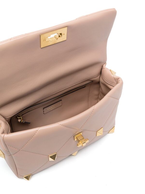 16273082_b0deca9c-a0cb-489c-a1f1-f465279d3d9a_1000.jpg Valentino Garavani Roman Stud top-handle bag