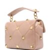 16273082_e4a81b27-7be1-4b65-86c5-86677a15462d_1000.jpg Valentino Garavani Roman Stud top-handle bag