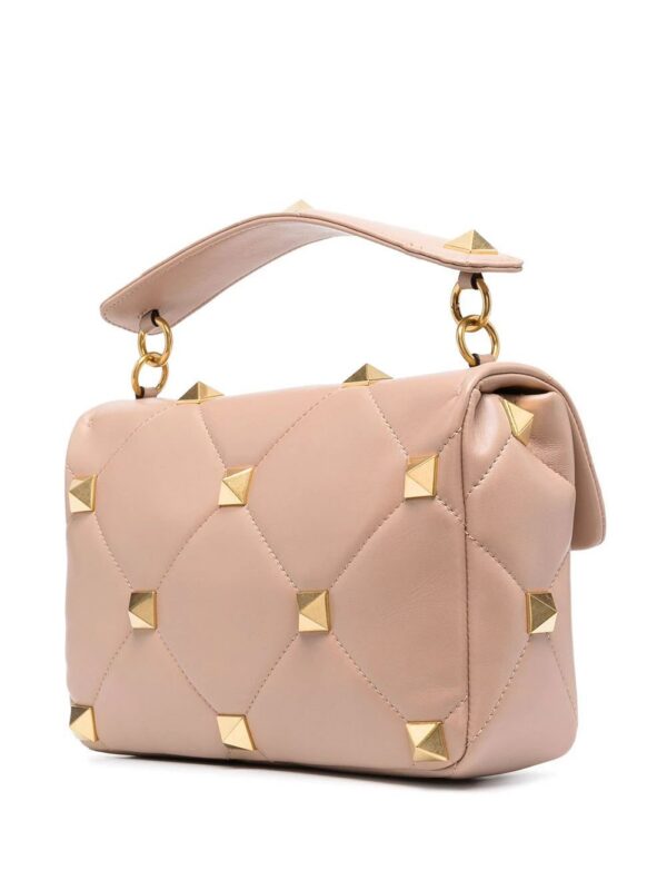 16273082_e4a81b27-7be1-4b65-86c5-86677a15462d_1000.jpg Valentino Garavani Roman Stud top-handle bag