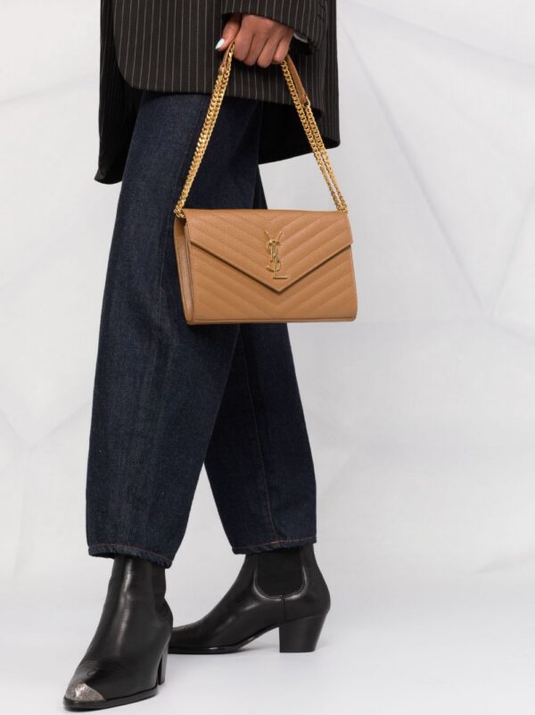 16634919_feef72b2-a09b-4afd-85a5-c7dfbb6ad6de_1000.jpg Saint Laurent logo plaque matelassé clutch