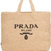 16763011_33136494_1000.jpg Prada logo-embroidered raffia tote bag