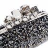 17229600_36500520_1000.jpg Alexander McQueen four-ring skull studded clutch