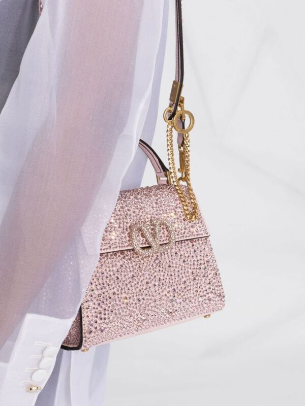 17529660_39660492_1000.jpg Valentino Garavani gem-embellished VSLING mini bag