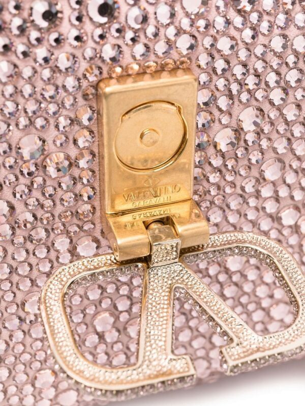 17529660_39662321_1000.jpg Valentino Garavani gem-embellished VSLING mini bag