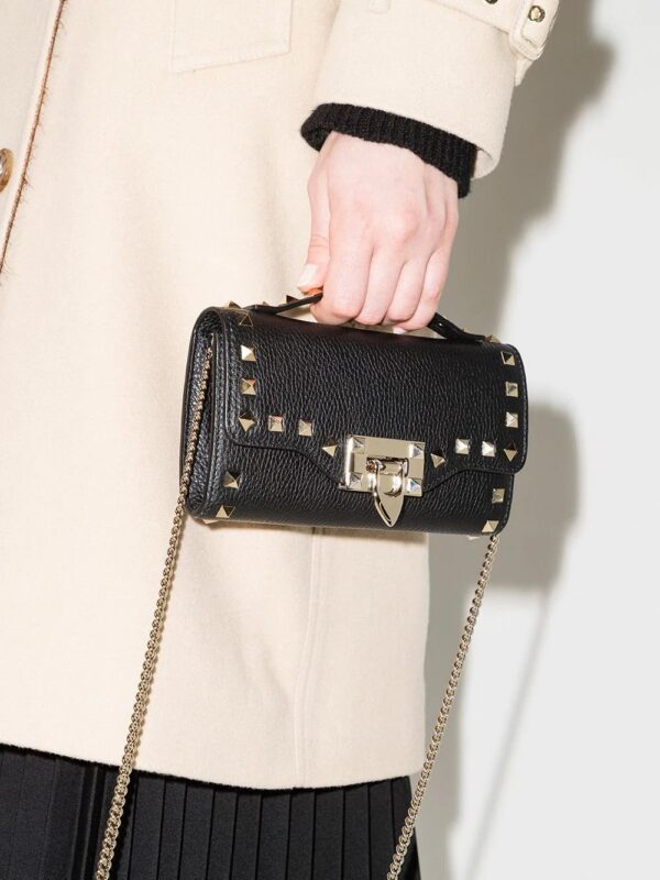 Valentino Garavani  Rockstud flip-lock fastening clutch Bag