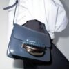 17913262_40643613_1000.jpg Chloé Kattie leather clutch bag