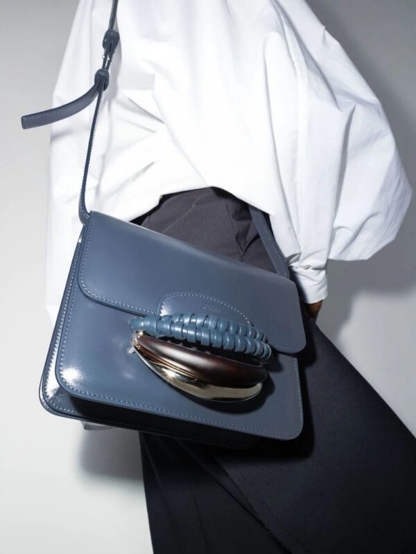 17913262_40643613_1000.jpg Chloé Kattie leather clutch bag