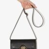 17982478_39780482_1000-1.jpg Tory Burch Miller clutch bag