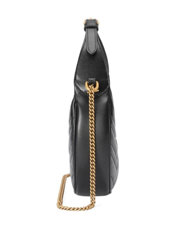18298996_39105233_1000.jpg Gucci GG Marmont half-moon shaped mini bag