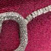 Valentino Garavani VLogo sequinned clutch bag