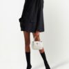 18393661_39596505_1000.jpg Prada logo-embellished leather mini bag