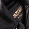 18440756_39696750_1000.jpg Moschino logo-plaque leather shoulder bag