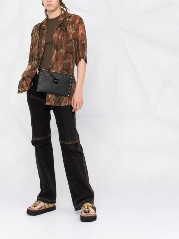 18457534_39675390_1000.jpg Versace logo-plaque studded crossbody bag