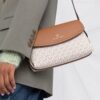 18473360_39787251_1000.jpg Michael Michael Kors monogram-pattern shoulder bag