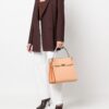 18527114_39957866_1000.jpg Tory Burch logo-plaque leather tote bag