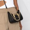 18555328_39987216_1000.jpg Versace logo-buckle shoulder bag