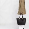 18556270_39972862_1000.jpg Versace logo-buckle tote bag