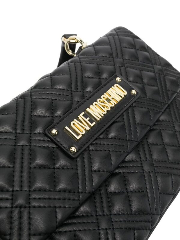18578511_40125329_1000.jpg Moschino logo-plaque quilted tote bag