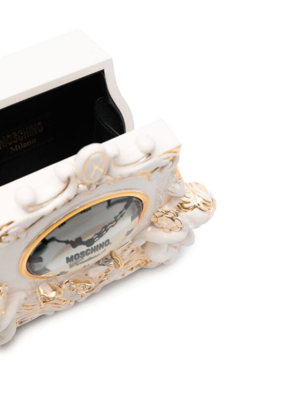 18663886_40358698_1000.jpg Moschino clock sculpted clutch