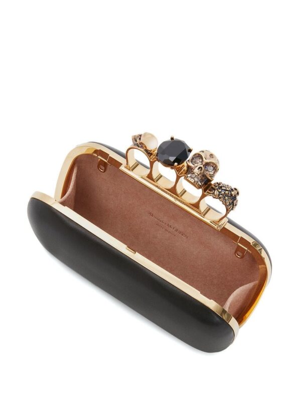 18734823_42654567_1000.jpg Alexander McQueen leather Skull Four-Ring clutch bag
