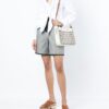 18738204_40708789_1000.jpg Tory Burch Bell laser-cut monogram shoulder bag