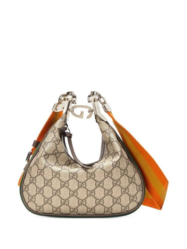 18858104_40902970_1000.jpg Gucci GG Supreme interchangeable-strap shoulder bag