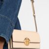 19434790_44189686_1000.jpg Tory Burch Miller logo-plaque clutch bag