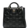 19456256_53167169_1000.jpg Gucci small GG matelassé top-handle bag