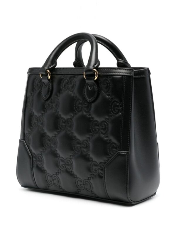 19456256_53167181_1000.jpg Gucci small GG matelassé top-handle bag