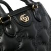 19456256_53167197_1000.jpg Gucci small GG matelassé top-handle bag
