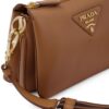 19568165_43663277_1000.jpg Prada logo-strap leather shoulder bag