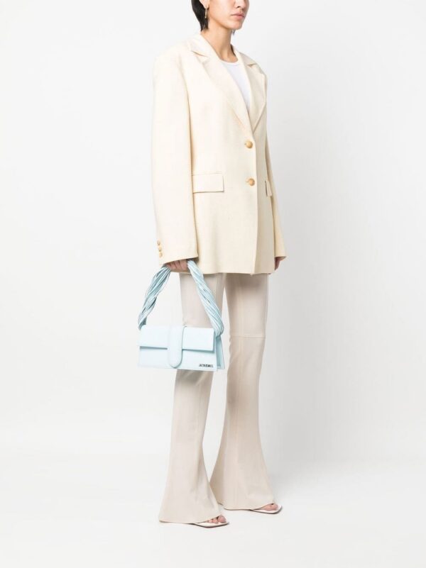 19572100_43700044_1000.jpg Jacquemus Le Bambino long Ficiu shoulder bag