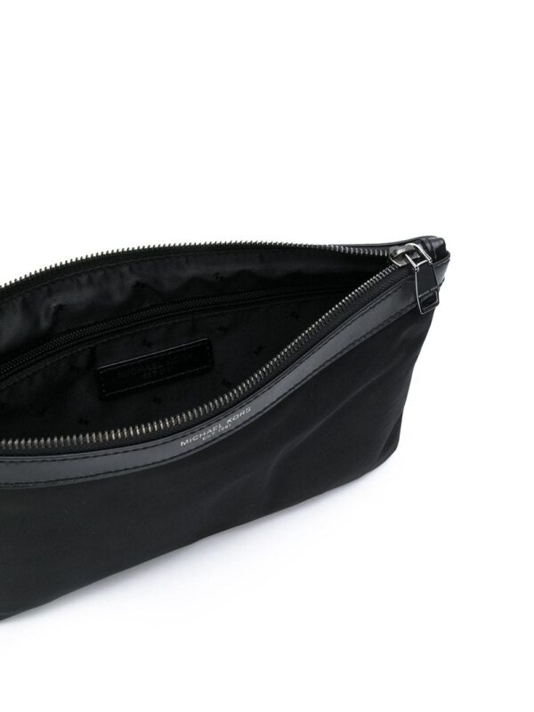 19596370_43840046_1000-1.jpg Michael Michael Kors logo-stamp leather clutch bag