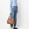 19740167_44264657_1000.jpg Michael Michael Kors Raven logo-plaque shoulder bag