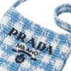 19778196_44229387_1000.jpg Prada houndstooth-pattern raffia shoulder bag
