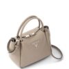19778202_44230028_1000.jpg Prada logo-lettering top-handle bag