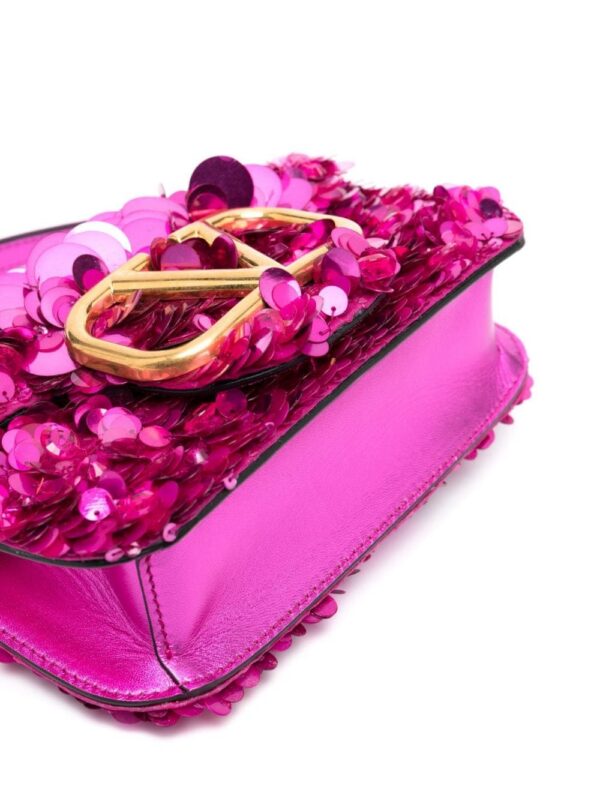 19933352_50861048_1000.jpg Valentino Garavani small Locò sequinned shoulder bag