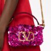 19933352_50861050_1000.jpg Valentino Garavani small Locò sequinned shoulder bag