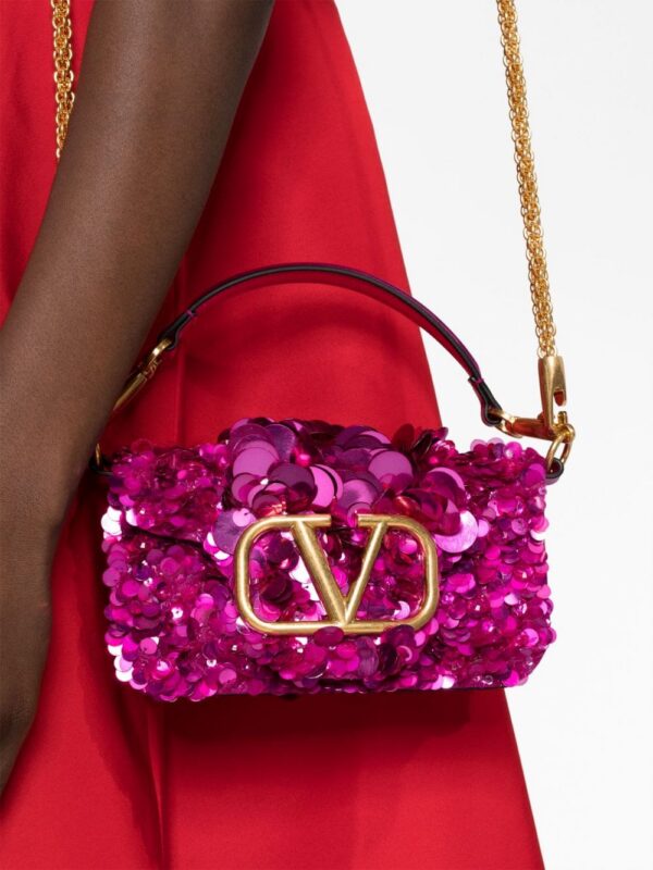 19933352_50861050_1000.jpg Valentino Garavani small Locò sequinned shoulder bag