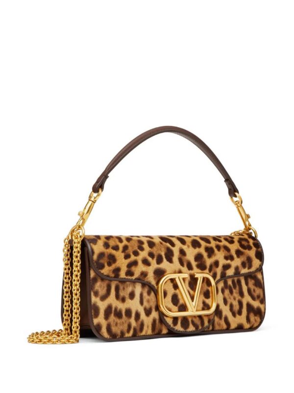 19949631_50232022_1000_9a82c653-a089-4b52-bedc-ee2f8d881ae1.jpg Valentino Garavani Locò calf-hair shoulder bag