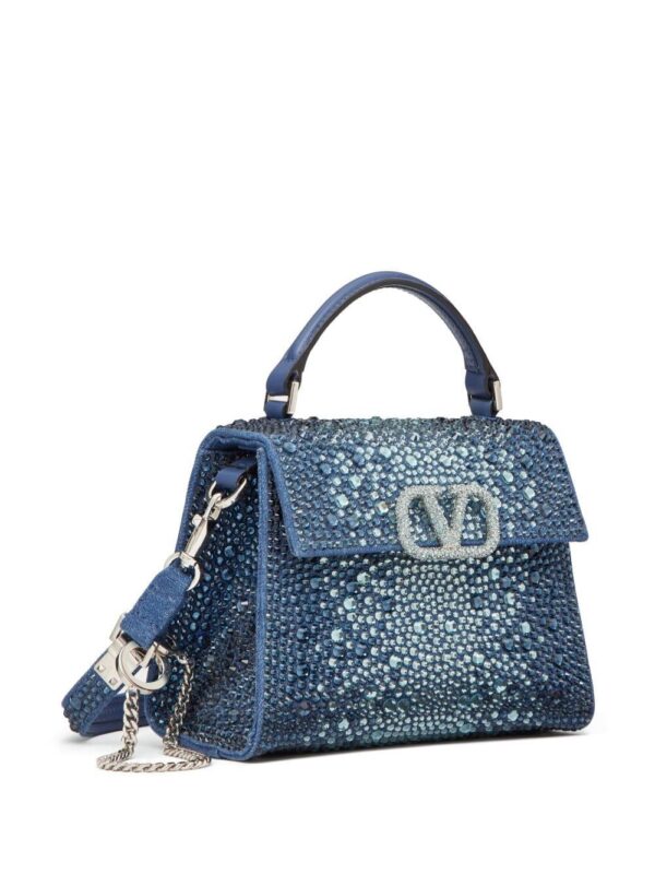 19950128_50485848_1000.jpg Valentino Garavani mini VSling rhinestone-embellished denim handbag
