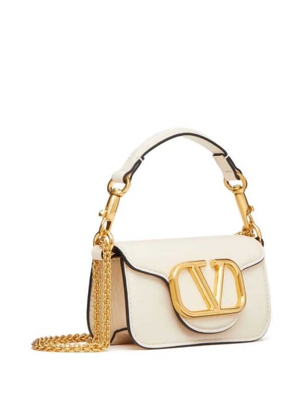 19950137_50231355_1000_7ad11cd8-5387-4083-a0c6-0a5589021604.jpg Valentino Garavani mini Locò shoulder bag