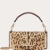 19950157_50233025_1000.jpg Valentino Garavani small Locò rhinestone-embellished shoulder bag