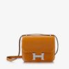1_400x_6a78c7b4-b0e2-4bf4-b1e8-10f5bebe17cc.jpg Hermès Constance 18 in Naturel Butler Sable with Palladium Hardware bag