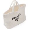 20097015_45228541_1000.jpg Prada logo-embroidered raffia tote bag