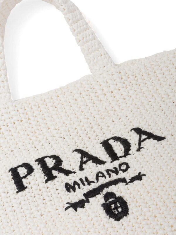 20097015_45228544_1000.jpg Prada logo-embroidered raffia tote bag